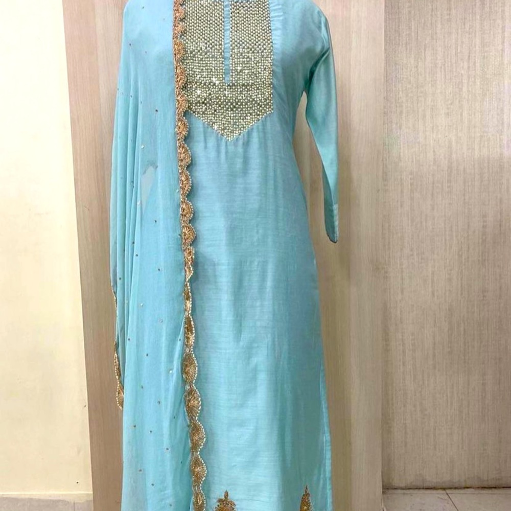 Pure art silk long straight sleeve with hand work on the suit